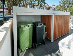 Bin bay — two 240L wheelie bins under cover